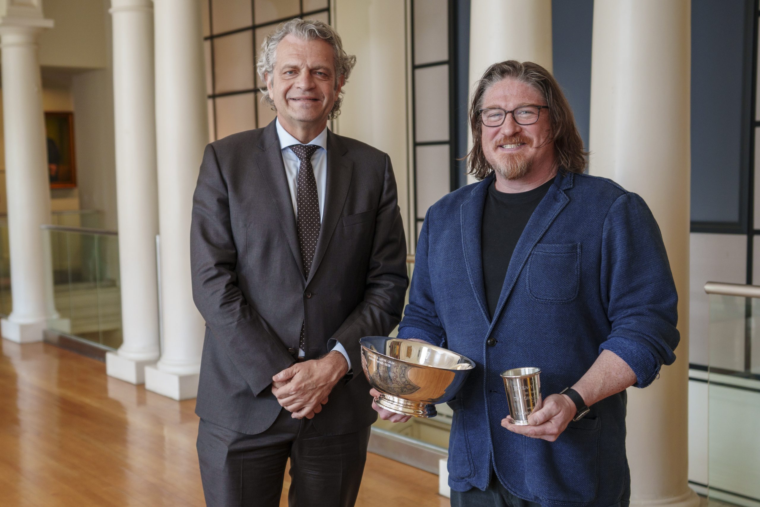 Chancellor Daniel Diermeier and Jeremy Payne pose with the Chancellors Cup.