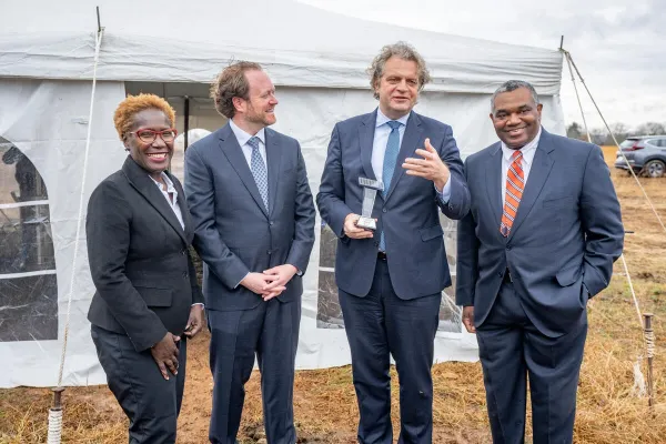 (L to r) Jeannette Mills, TVA executive vice president and chief external relations officer; Matt Beasley, Owen'09, chief commercial officer, Silicon Ranch; Chancellor Daniel Diermeier; and Decosta Jenkins, president and CEO of NES (John Russell/Vanderbilt University)