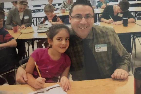 Evelyn Marx and her late father, Matthew, when he surprised her at her elementary school’s Pi Day celebration (Submitted photo)