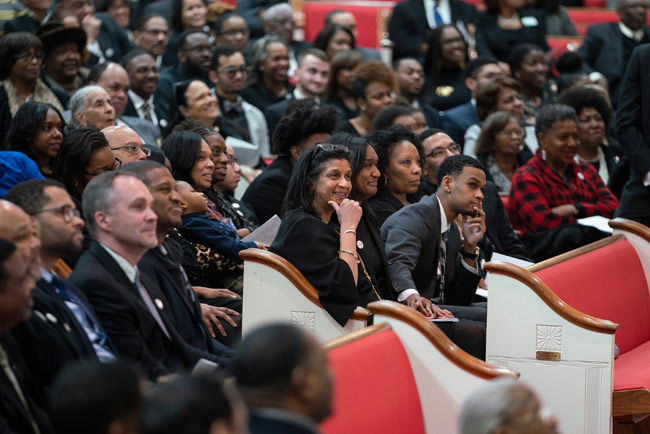 Gail Williams, associate director of Community, Neighborhood and Government Relations at Vanderbilt, and family at the Feb. 15 funeral service. (Joe Howell/Vanderbilt)