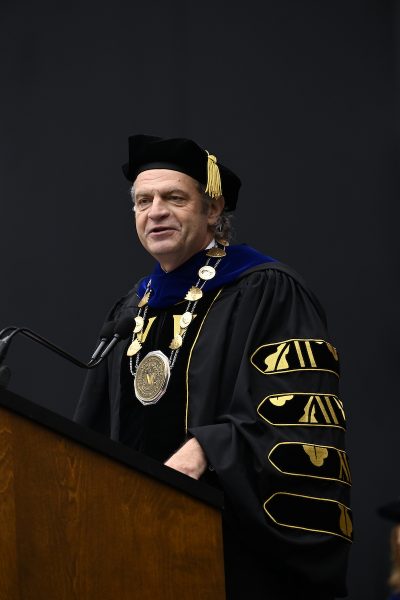 Chancellor Daniel Diermeier stands before a podium