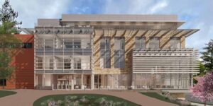 Rendering from William Rawn Associates, Architects, Inc., show a bird's-eye view and an exterior elevation of the Management Hall expansion and renovation.