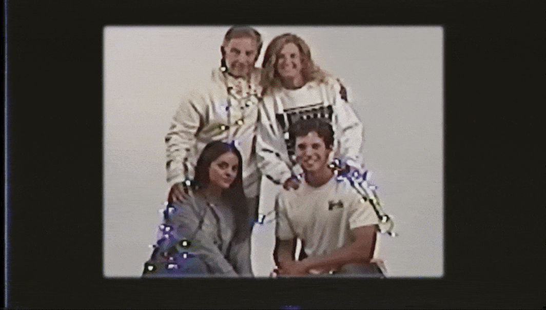 GIF text reads: "Happy Holidays. Shop now at vanderbiltshop.com" and features four people in Vanderbilt gear posing in a "Christmas card-esque" style. 
