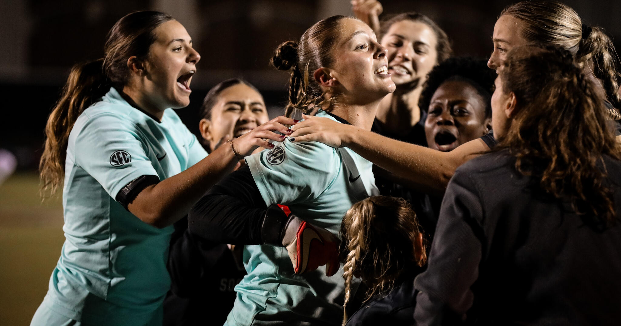 Members of the Vanderbilt soccer team celebrate a win against Florida State, taking them to the Sweet 16 for the first time in program history. 