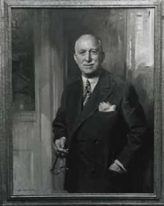 The portrait of Frank Houston, which helped diffuse some disagreement, still hangs in Management Hall.