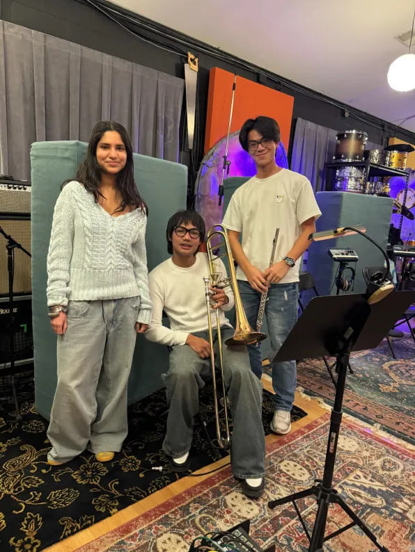 Students from the Blair School of Music record original music to be used in Imagine Land 2040. Left to right are Aaliya Ramakrishnan, composer, John Calma, trombone, and Terry Li, flute. (Submitted photo)