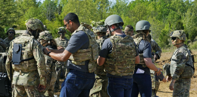 Associate Professor of Mechanical Engineering Karl Zelik, center, collaborated with soldiers of the 101st Airborne Division to develop SABER.