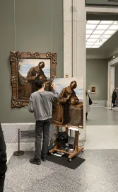 Gina Yu in Spain "This project was completed throughout Europe in dozens of museums and galleries in the winter of 2023. I traveled to three countries: Spain, France, and Switzerland. I explored the intersection between art, neuroscience, and society, currently in writing for over 100 pages. This moment was one of my favorites during my abroad experience. At Museu Nacional d’Art De Catalunya, Barcelona. One young artist stood out amidst a busy stream of bumbling tourists–painting and maintaining a posture of composure and intention."