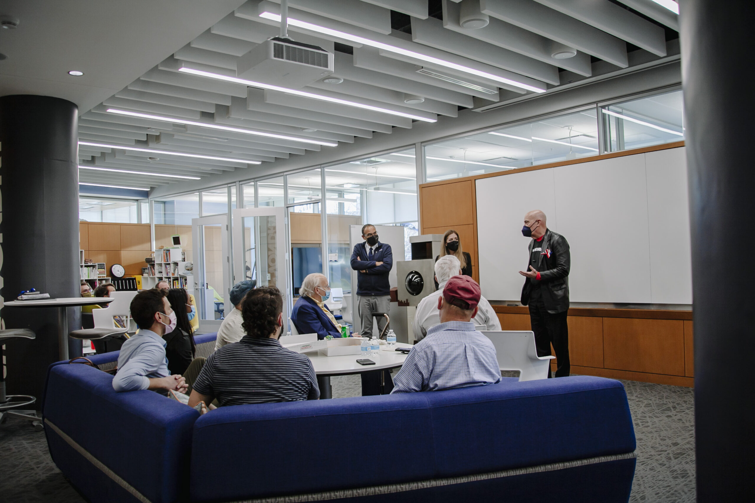 Wond’ry Innovation Center mentor Stryker Warren meets with fellow mentors.