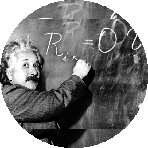 photo of Albert Einstein writing on a chalkboard