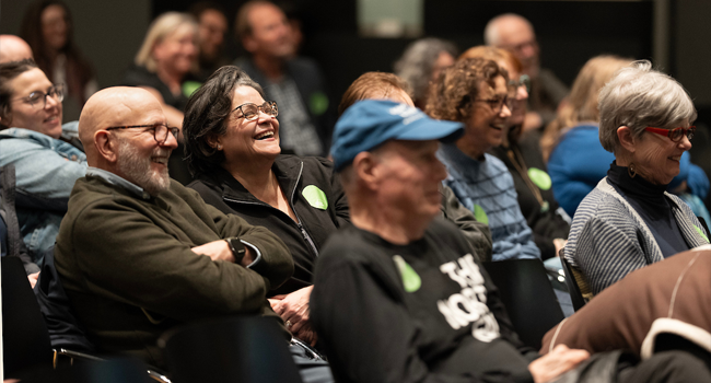 Smiling audience at Vanderbilt's “Food for Thought'' event led by Ted Fischer, Cornelius Vanderbilt professor of anthropology,