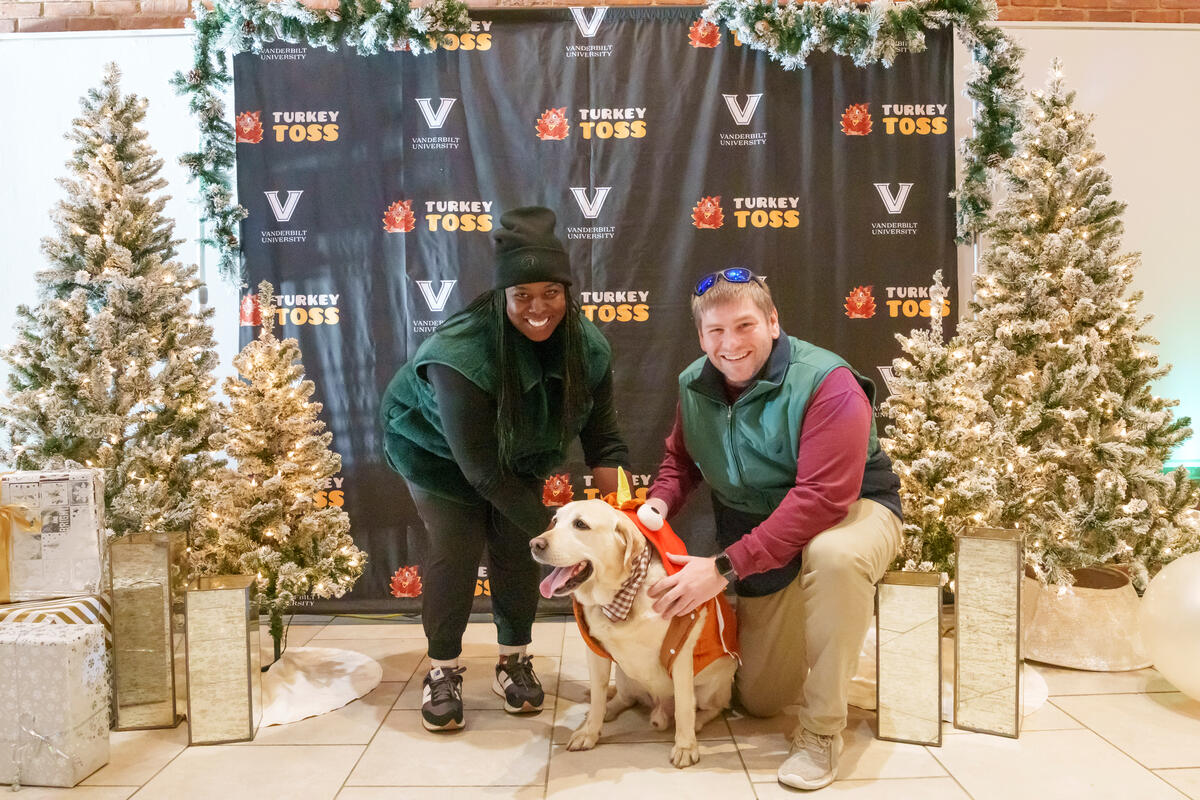 Vanderbilt employees pose with Officer Jack, dressed in a turkey costume, at the annual Turkey Toss 2023. 