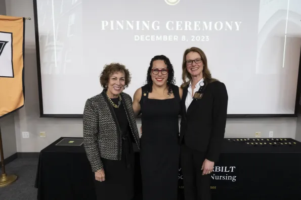 Dean Pamela R. Jeffries, Vanessa Morales and director of nurse-midwifery Kendra Faucett at the School of Nursing pinning ceremony, Dec. 2024 (Vanderbilt/Joe Howell)
