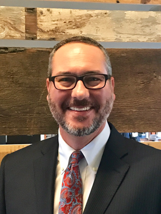 Brian Heuser, faculty director of the Ingram Scholarship Program