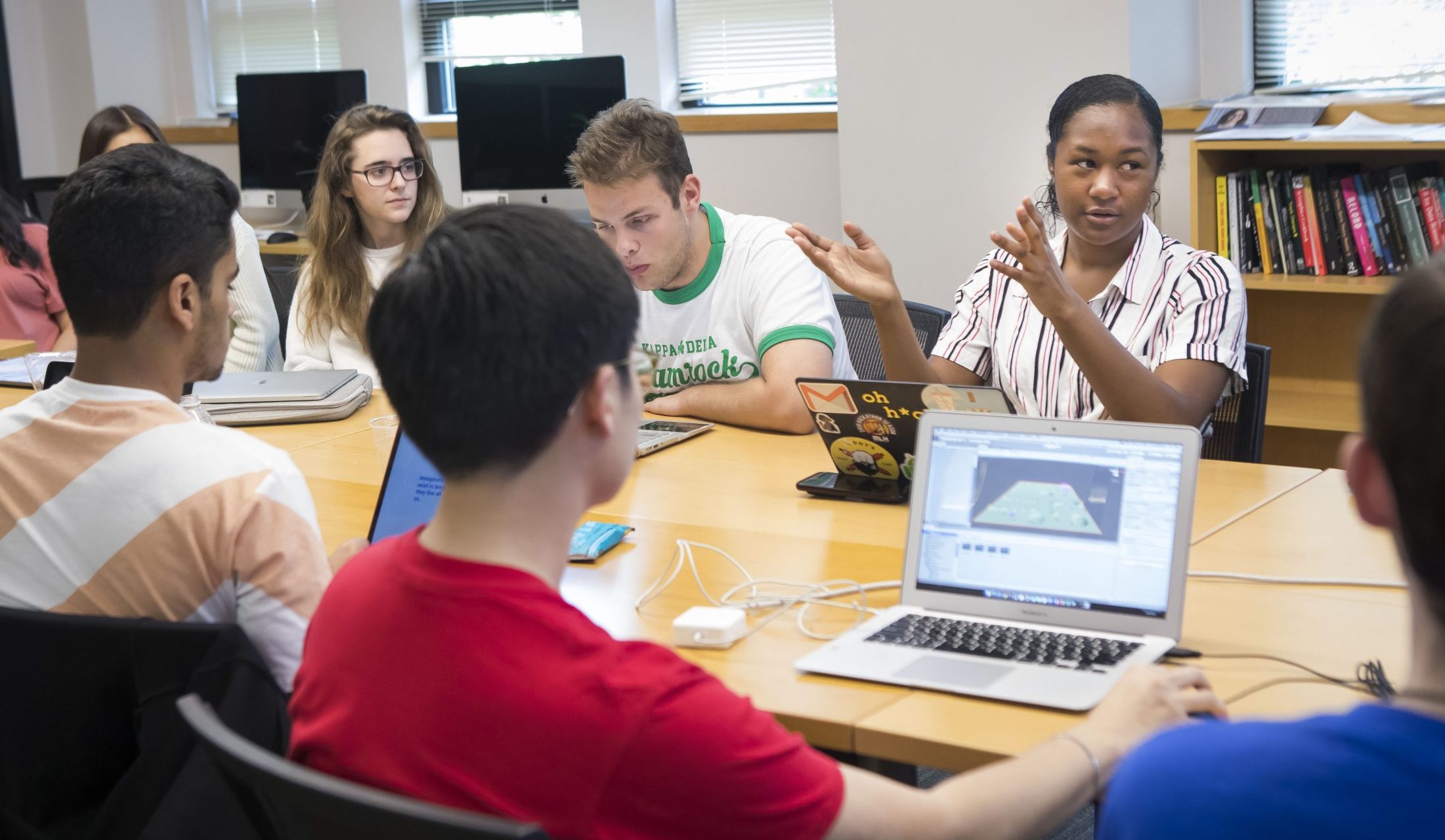 Ethnically diverse college students in class