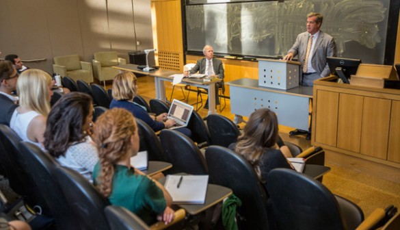 Mayor Karl Dean (at podium) speaks to Adjunct Professor of Public Policy Studies Bill Purcell's (left) Cities in the 21st Century class Sept. 8. (Daniel Dubois/Vanderbilt)