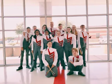 Tatum Earp and the percussion squad from her high school band (Submitted photo)