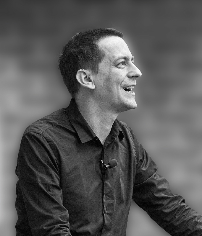 Black and white headshot of Vanderbilt alumnus John Jumper