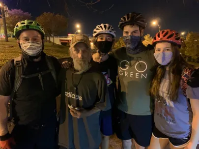 Barnes along with volunteers from the Nashville Urban Bicycle Ministry and one of their favorite clients.