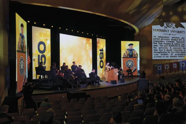 Chancellor Daniel Diermeier (pictured at the podium) was joined on stage at the Langford Auditorium ceremony by a cross-section of the university community, including administrators, staff, students, faculty and alumni. Among them was alumnus and former U.S. Sen. Lamar Alexander, BA’62, (pictured to Diermeier's right), who shared his reflections on Vanderbilt’s history.