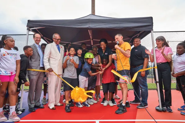 Ribbon-cutting at Hoops and Hope, a renovation project at Watkins Park in honor of pioneering SEC athlete Perry Wallace