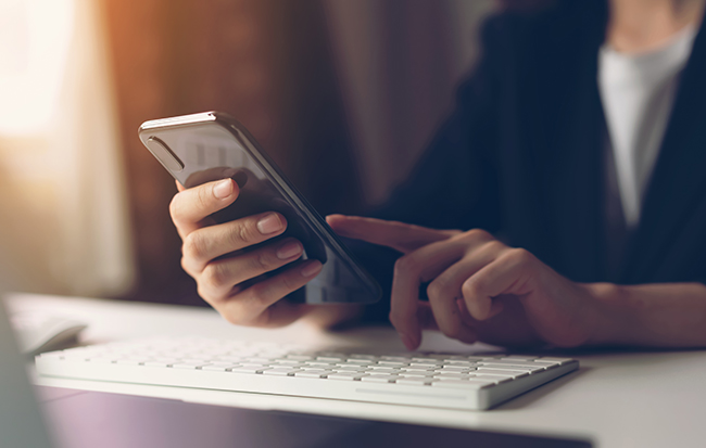 Woman using smartphone. The concept of using the phone is essential in everyday life. (Getty Images)
