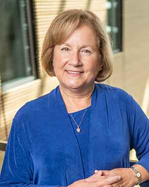 VUSN professor Julie Barroso standing in VUSN atrium 