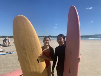 Surfing with a friend in Byron Bay, Australia. (Submitted)