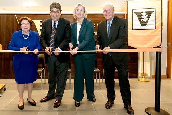Linda Norman, Nicholas Zeppos, Susan Wente, Bruce Evans cut ribbon