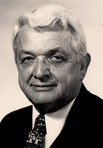 Black and white portrait of Dean Luther Christman