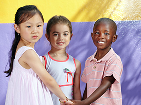 trio of children holding hands