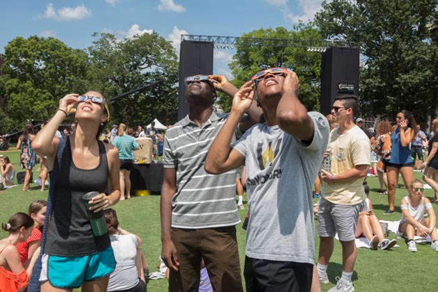 Vanderbilt students view the total solar eclipse on Aug. 21, 2017, from the celebration on Alumni Lawn. (Susan Urmy/Vanderbilt)