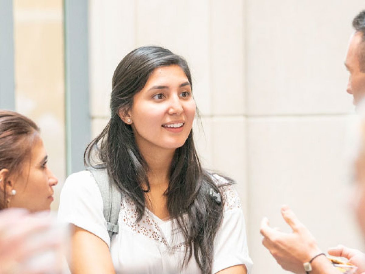 students and faculty discussing