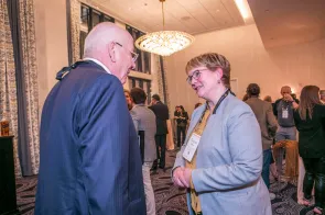 Vice Provost Vanessa Beasley speaks with an attendee during Volunteer Leadership Weekend.