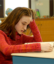 Girl struggling with reading