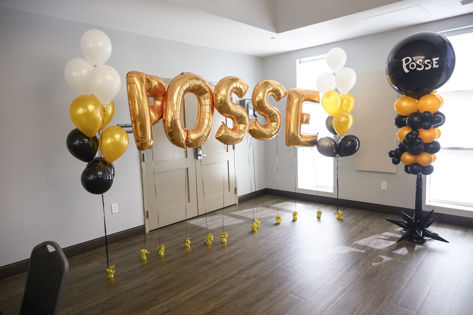 Gold foil balloons spell out 
