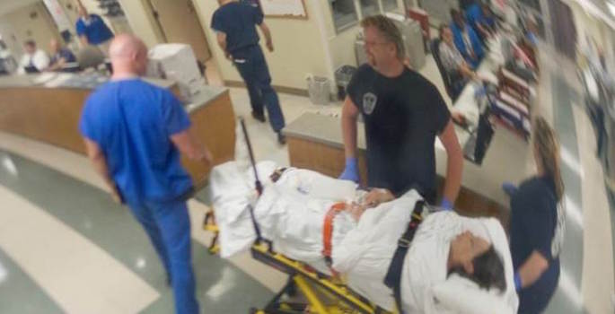 fish-eye security photo of emergency room