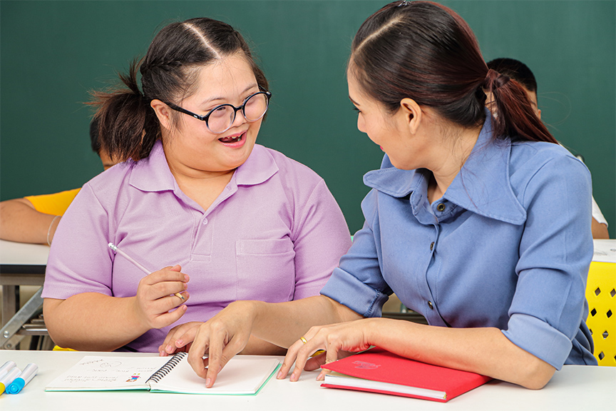 teacher monitoring student work