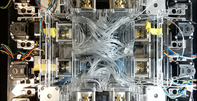 close up of device with 96 tiny tubes swirling about.