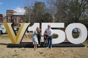 Vanderbilt community members enjoy a party on Alumni Lawn March 25 as part of the Sesquicentennial kickoff celebration. (Joe Howell)
