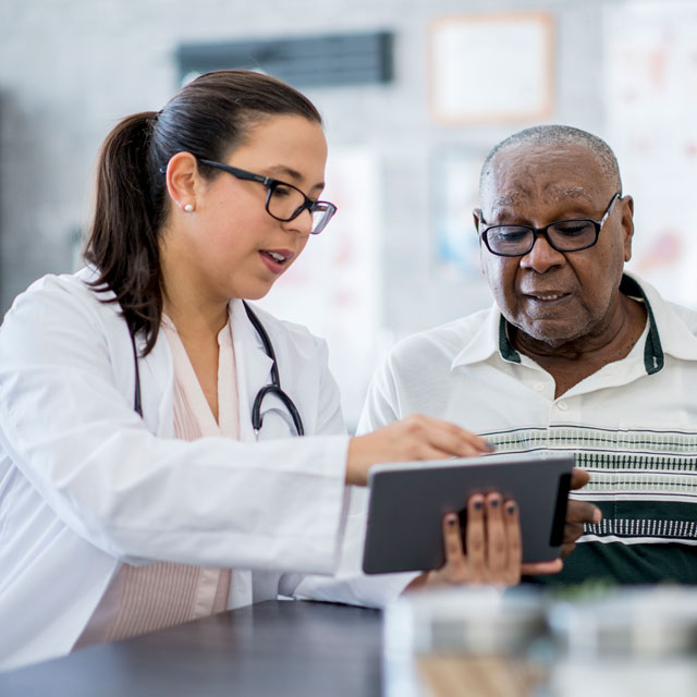 Doctor speaking to patient about weight loss procedure