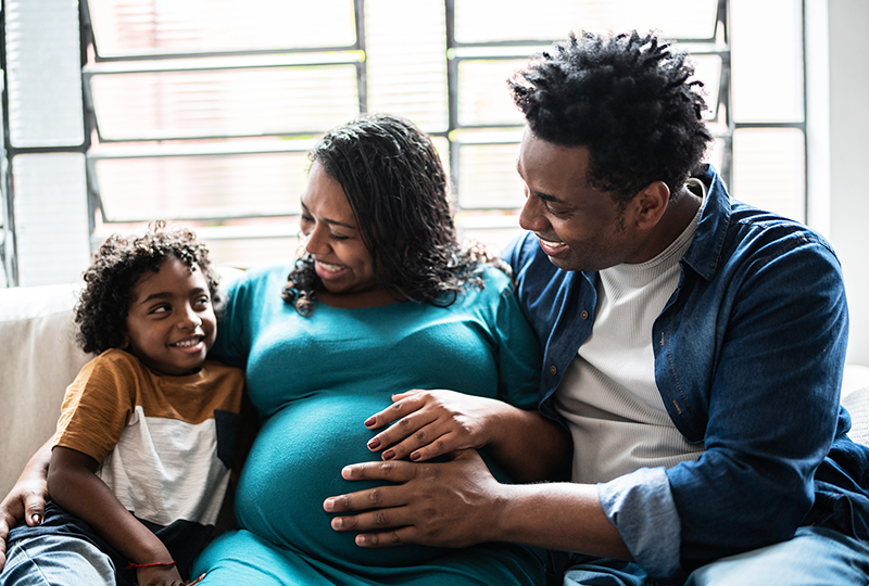 Pregnant family celebrating