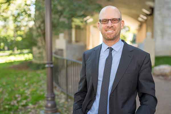 Vanderbilt Professor Dr. Jonathan Metzl stands outside Vanderbilt's Calhoun Hall