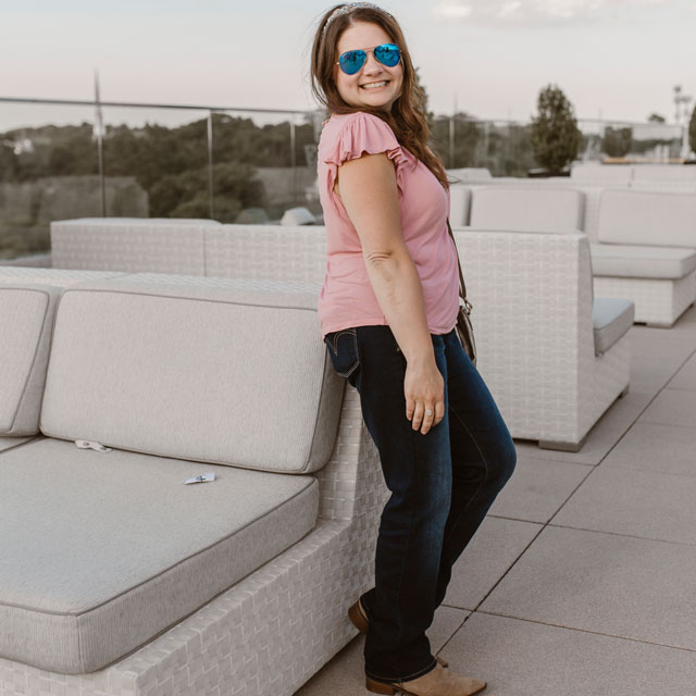 Author Heather Duggin poses at an outdoor reunion in 2020.