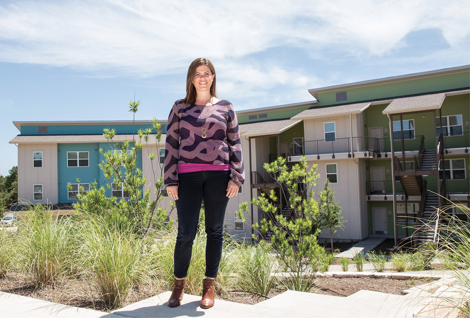 Peachy Myers, former White House liaison to the Corporation for National and Community Service, is now director of community engagement for Foundation Communities in Austin, Texas. Here, Myers visits Live Oak Trails Apartments, one of Foundation Communities’ newest properties providing affordable, attractive housing and free onsite support services for families, veterans, seniors and individuals with disabilities. (WHITNEY DEVIN)