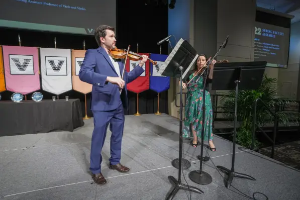 Blair School of Music faculty performers Stephen Miahky and Christina McGann perform at the Spring Faculty Assembly.