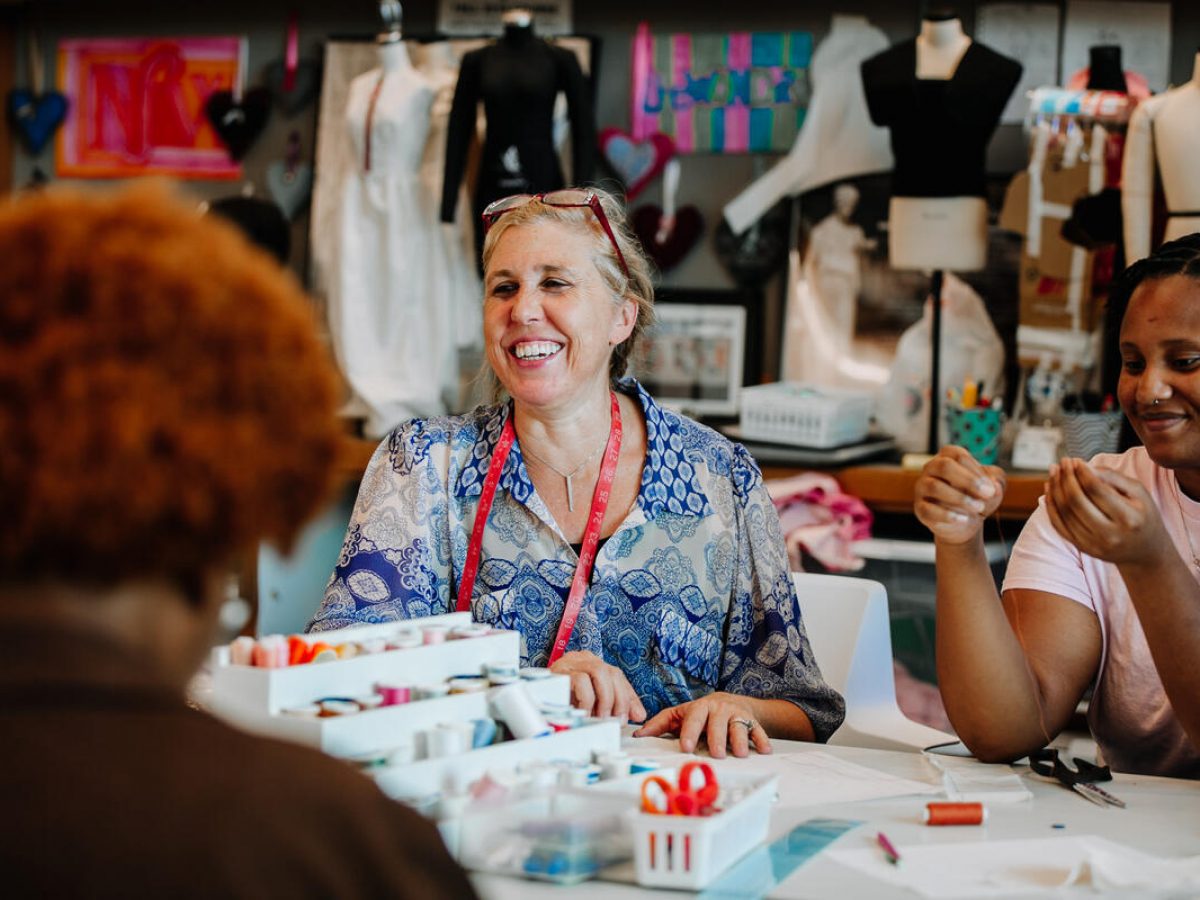 Alex teaching a sewing class