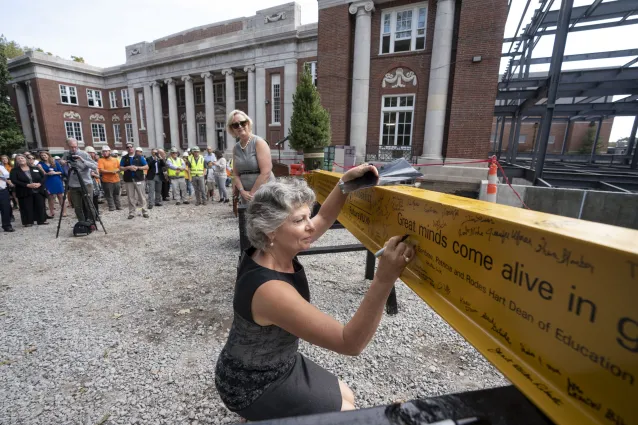 Topping Out Ceremony at Peabody College and the symbolic signing of the construction beam.
