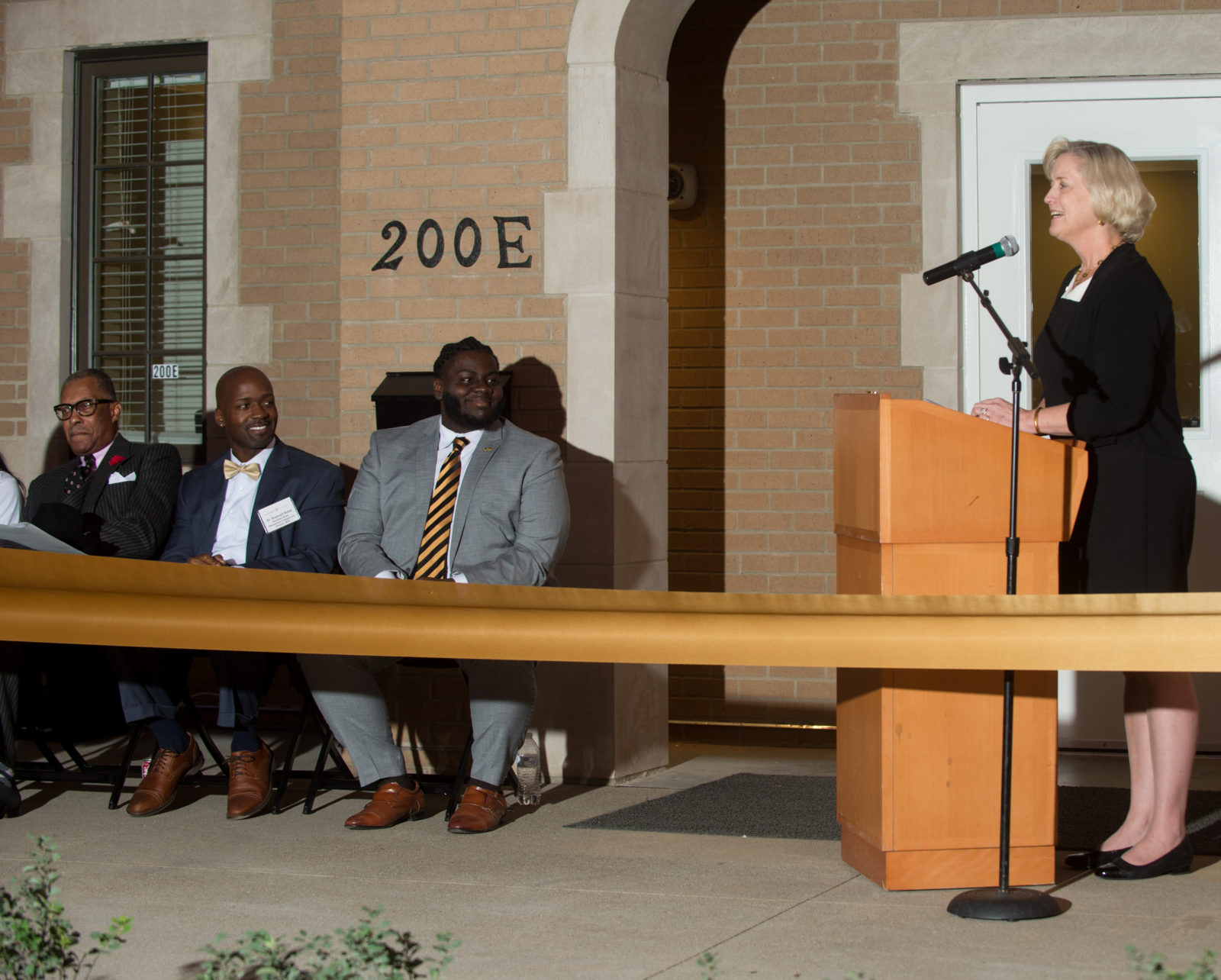 Interim Chancellor and Provost Susan R. Wente giving remarks at the new Pan-Hellenic Council House house ribbon-cutting at Vanderbilt University on Oct. 18, 2019. (Price Chambers for Vanderbilt University)