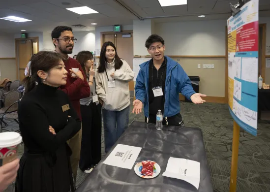 Poster presentation: Quality health and well-being in China: (left to right) Yu (Wendy) Wu, Ali Abit, teaching assistant for the class, Ran Huo, Haoyue Lu, Chunxu Zong, 11/15/24 (Photo by Joe Howell/Vanderbilt University)
